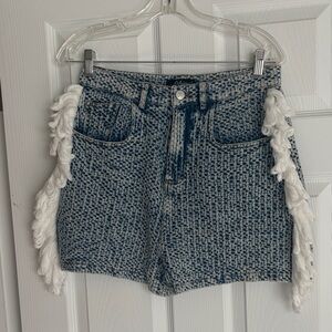 Athina shorts- denim like fabric, chunky feel/look. Medium. Cute white fringe